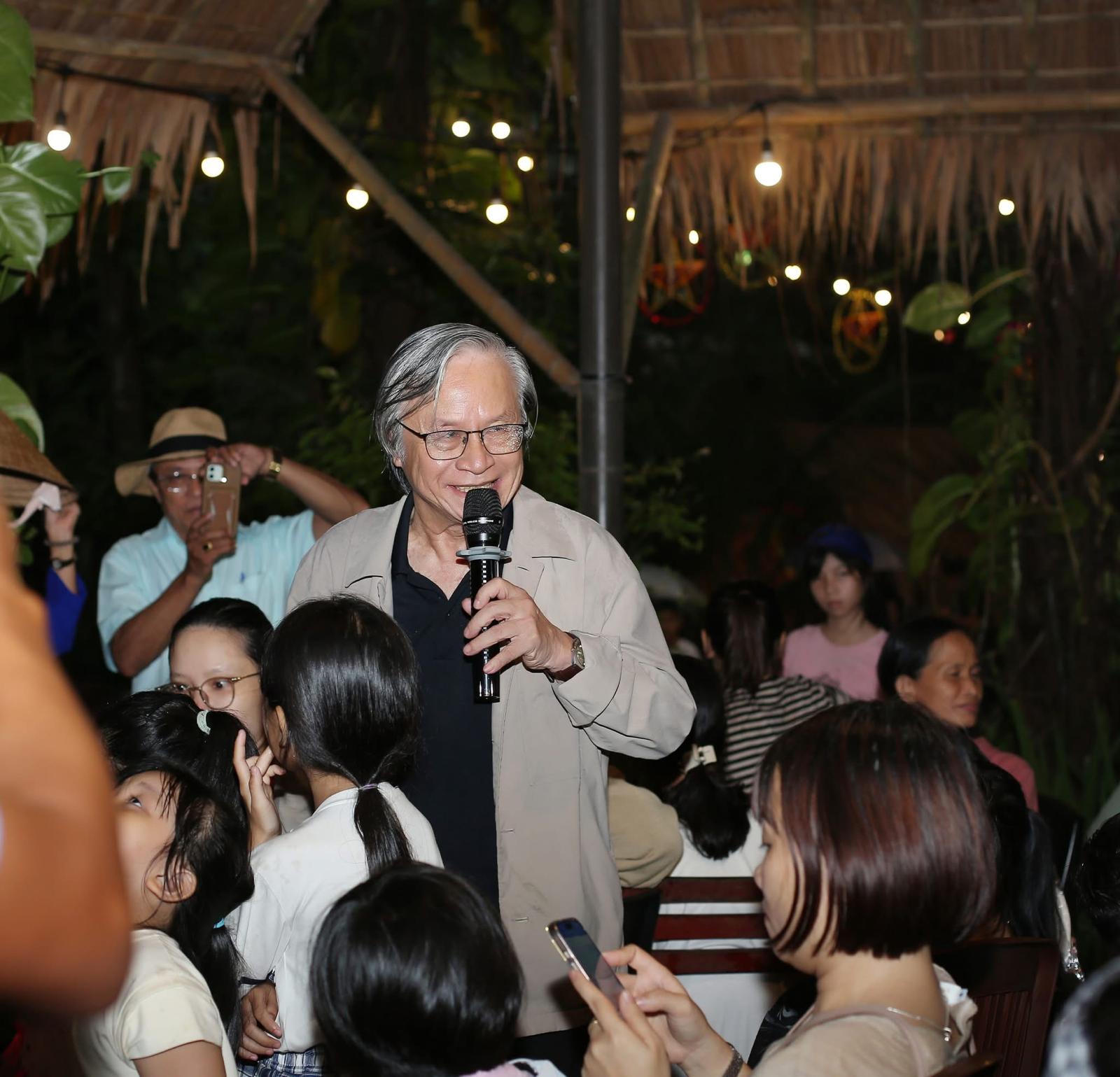 Evening storytelling under string lights