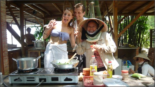 Cooking class with guests and local chef at outdoor kitchen