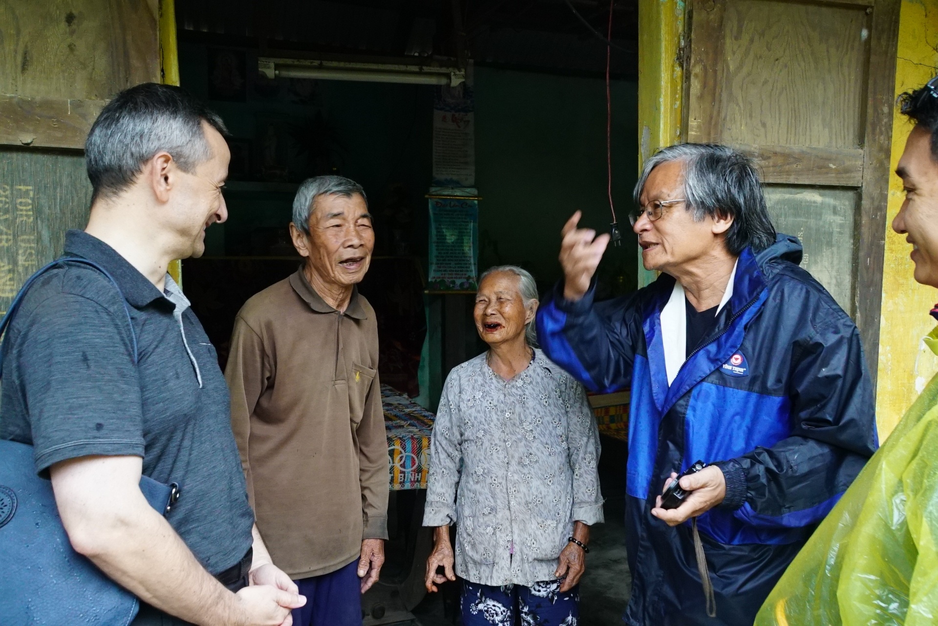 Villagers meeting with representatives from the French Consulate General