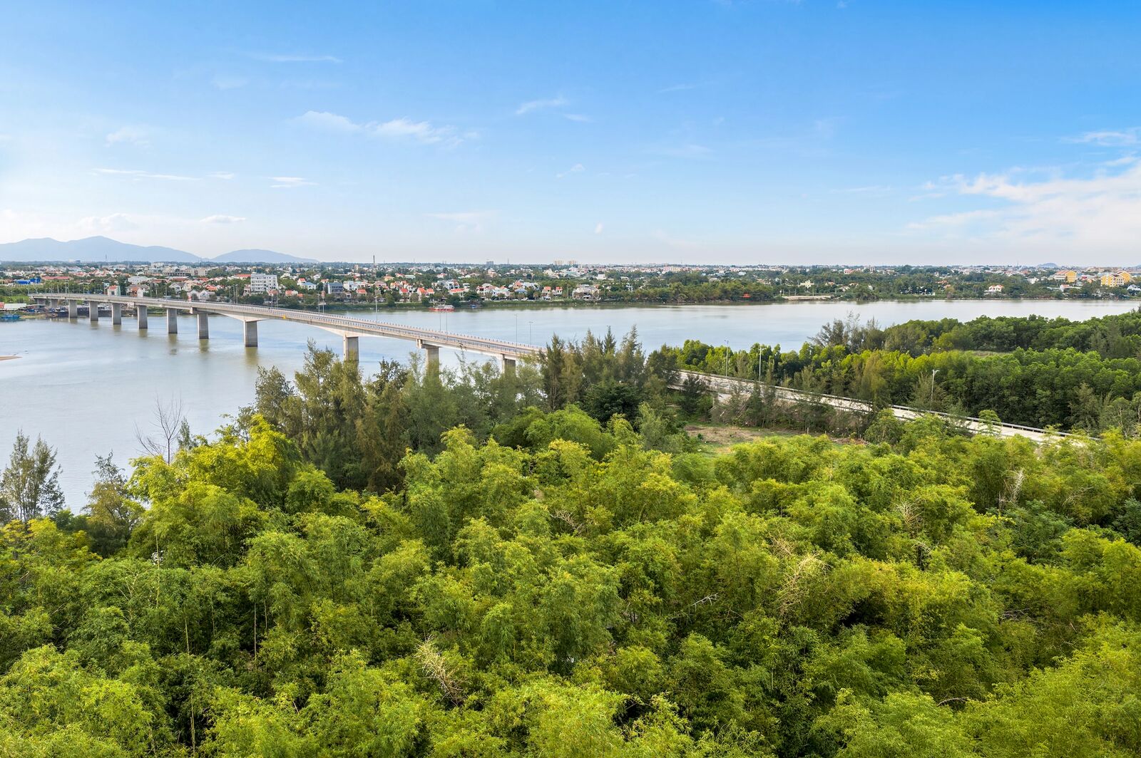 The Thu Bon river and the bridge to Hoi An, ten minutes away