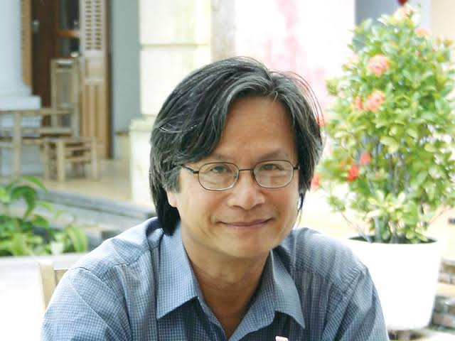 Portrait of architect Bùi Kiến Quốc, founder of Triem Tay Gardens