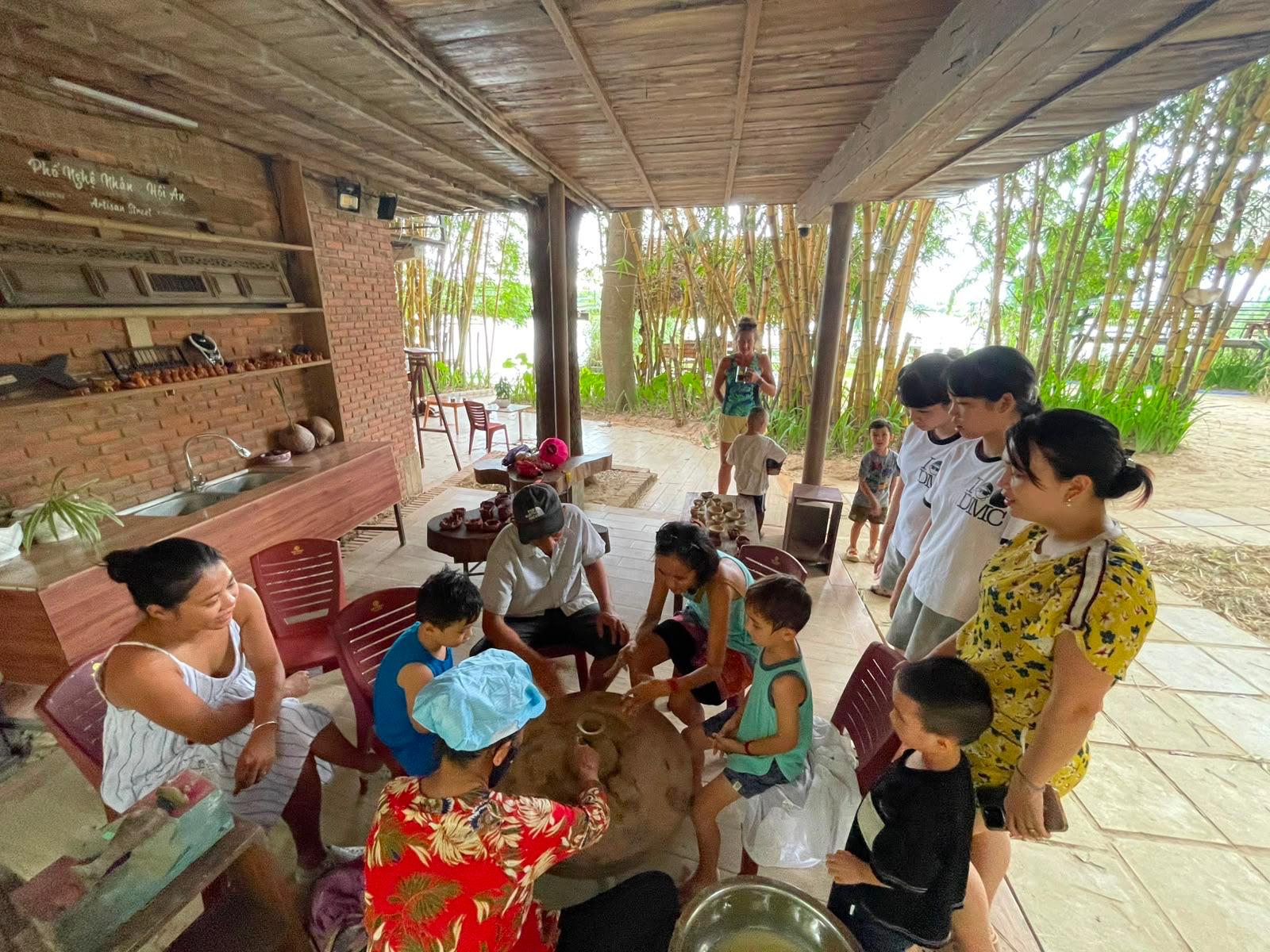 Pottery demonstration on Artisan Street beside the bamboo grove