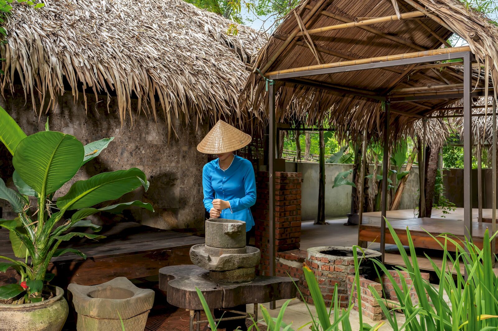 Grinding rice at the old stone mill