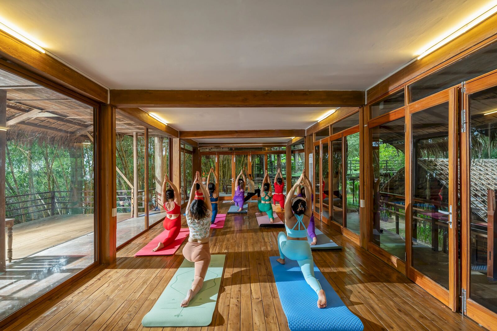 Practice in the glass-walled yoga room