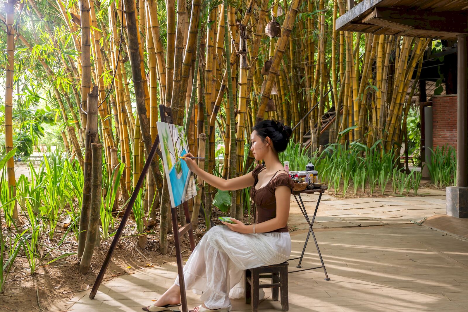 A quiet afternoon of painting among the bamboo